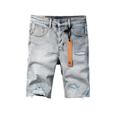 Purple Jeans Men's Vintage Light Wash Ripped Denim Shorts with Raw Cut Hem and Distressed Details 2003